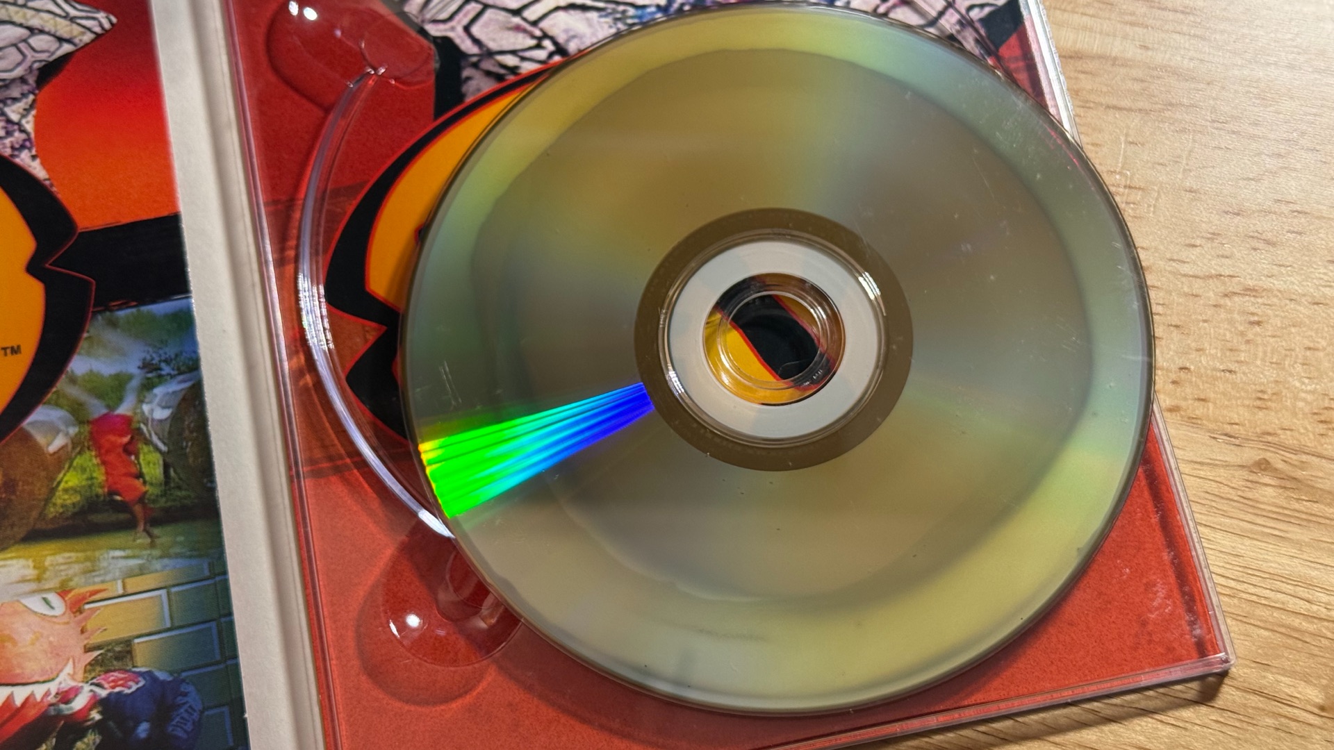 A DVD with rot. A discolored ring on the disc.