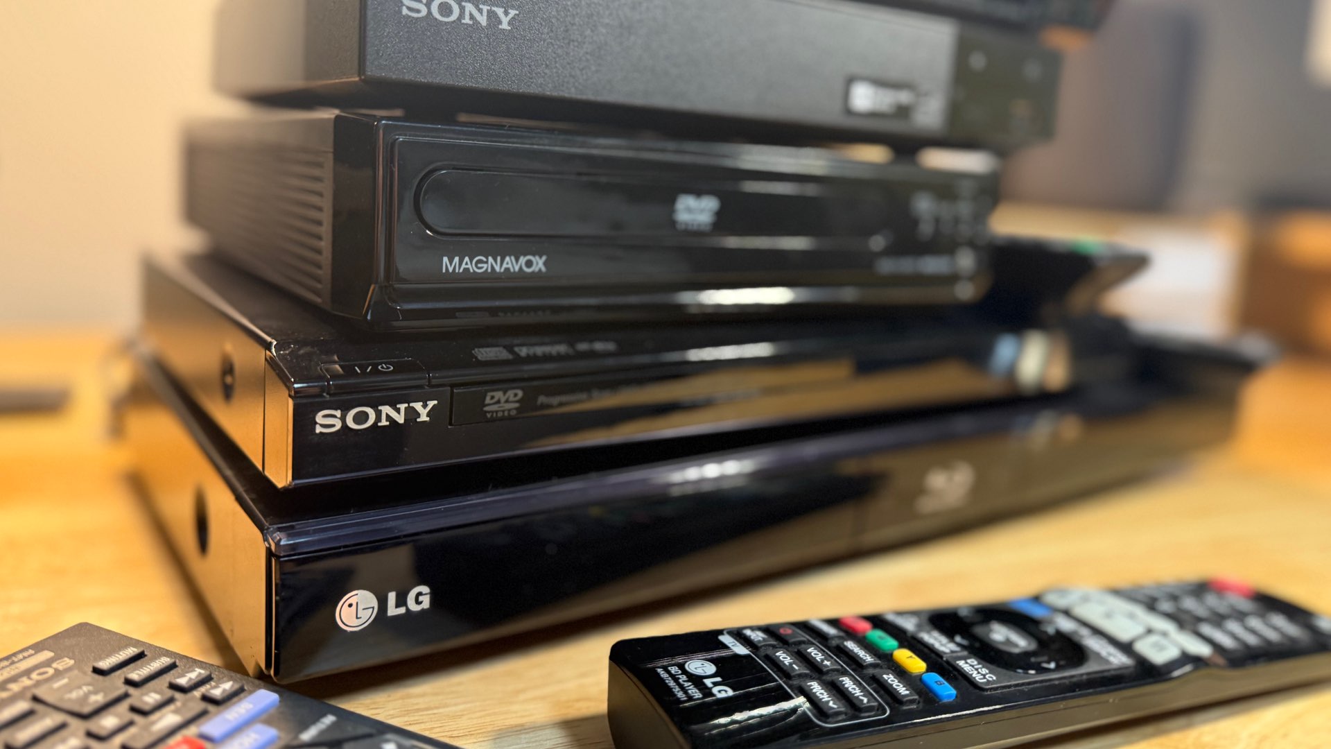 A stack of DVD/BR players